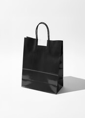 Glossy black bag with white sticker on white background