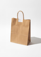 Kraft bag with white sticker on white background