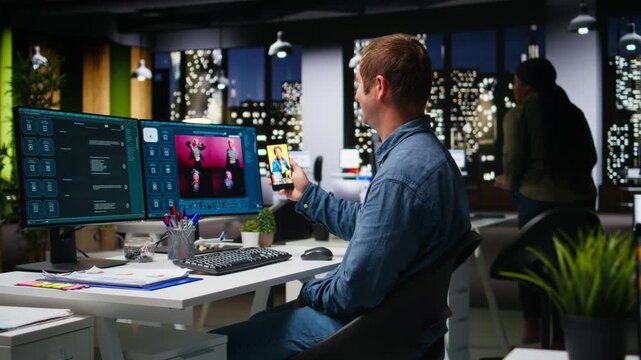 Male photo editor retouching images and scrolling on social media to see content, comparing lighting and color correction technique. Professional designer generating creative photos. Camera A.