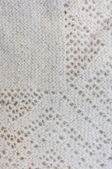 Beige knitted wool texture, soft natural woolen fabric background macro