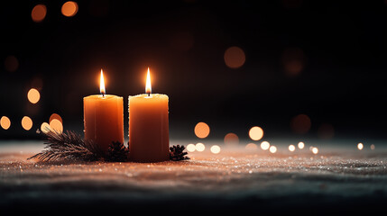 Candles glow softly in the dark, creating a warm and cozy atmosphere for a quiet evening indoors