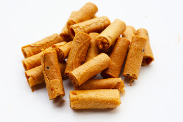 Rolled crispy wafers filled with shredded pork floss, Thai snack.