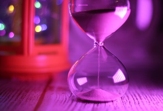 Hourglass bright photo concept of passing time life 