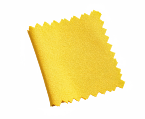 Angled yellow fabric swatch with zigzag edges — isolated on transparent png background