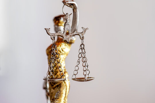 reflective metallic sculpture embodies legal integrity and brand sophistication, shimmering metal plaque underscores professionalism and reliability in corporate legal branding visuals