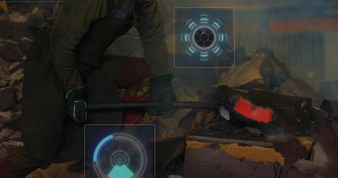 Crouching industrial worker wearing safety gear, using sledge in foundry with glowing metal and HUD