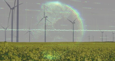 Showing row of modern wind turbines spinning over yellow crop field, with holographic data overlay
