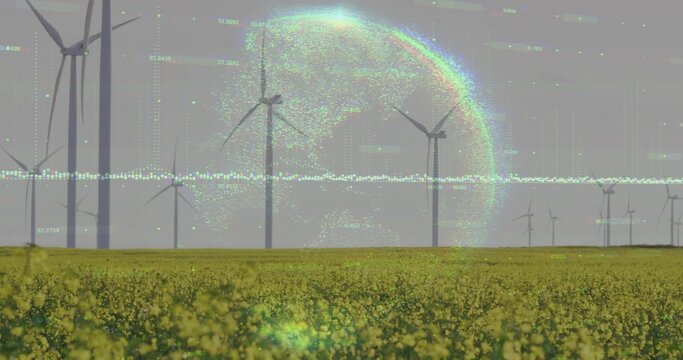 Showing row of modern wind turbines spinning over yellow crop field, with holographic data overlay