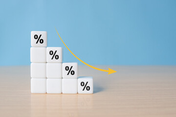 dice with percentage sign and down arrow, financial recession crisis, interest rate fall, investment reduce, risk management concept