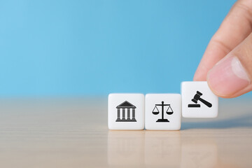 Dice shape with icon law legal justice. Law business and justice banner. Modern flat cube block design with court, scale and justice symbols on smart grey background and copy space.