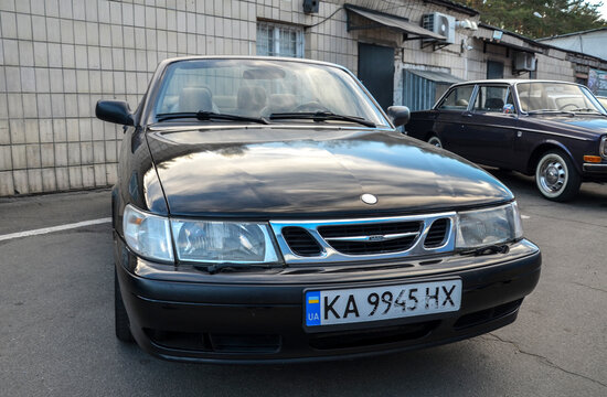 Classic black first generation 1999 Saab 9-3 convertible known for its distinct, quirky Swedish design and focus on safety and performance