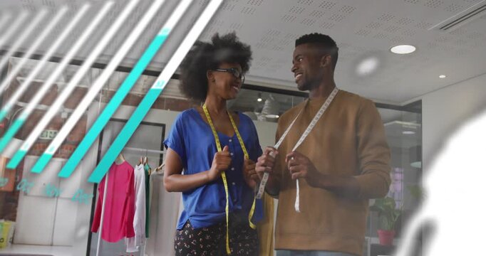 Two fashion designers holding tapes, data overlay drifting and revealing clothing, checking fit