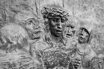 Station X: Jesus is stripped of his garments (Division of robes). The Way of the Cross on Mount Križevac (the Cross Mountain) in Medjugorje.