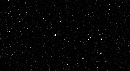Obraz premium Abstract dark background with sparkling dots creating a starry night effect