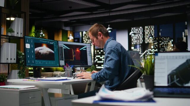 Male IT engineer uses AI techniques to create video game and a turbine, futuristic gaming design for a Mars station project. Sci fi system for a modern game lobby, professional software. Camera A.