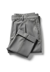 A pair of neatly folded grey formal trousers with a subtle textured weave showing belt loops pleats and side pockets resting on a white surface