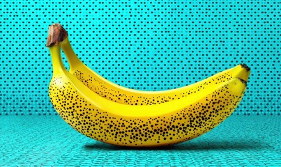 Two ripe bananas on blue pixelated background