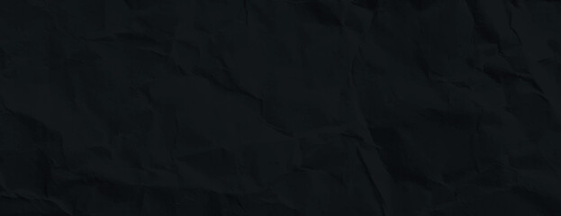 A black background with a crumpled texture. The background is entirely black, creating a dark and textured appearance. Paper texture background vector. Black background.