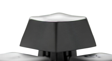 Keyboard Keycap: A close-up view of a sleek, modern keycap, showcasing its geometric design and polished finish, reflecting light.