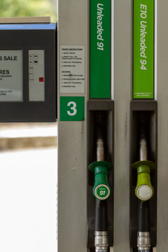 Unleaded 91 and E10 fuel nozzles at petrol pump bowser.