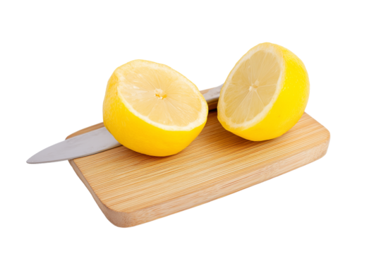 Two halves of a bright yellow lemon on a wooden cutting board with a knife, isolated on transparent background
