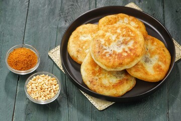 Hotteok is a pancake filled with bean paste, sold as a South Korean snack food