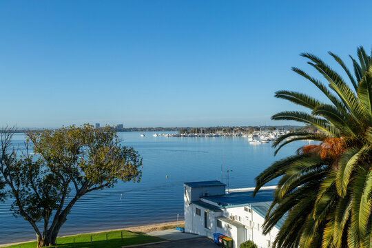 Overlooking Swan River with yachts moored and docked at Royal Perth Yacht Club.