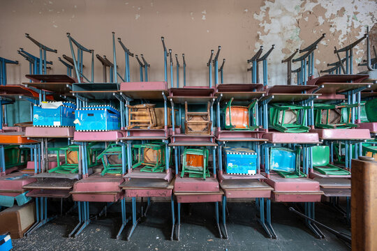 Desks at an abandoned school
