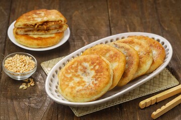 Hotteok is a pancake filled with bean paste, sold as a South Korean street food.