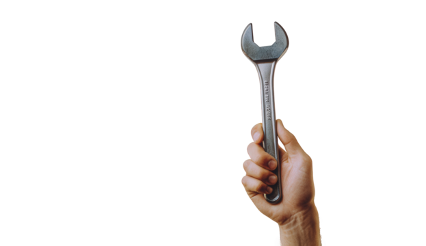 Hand holding a wrench isolated on transparent background, showcasing the tools design and utility for mechanical work and repairs in various industries and settings