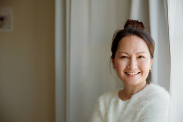 A portrait of a happy and cheerful woman