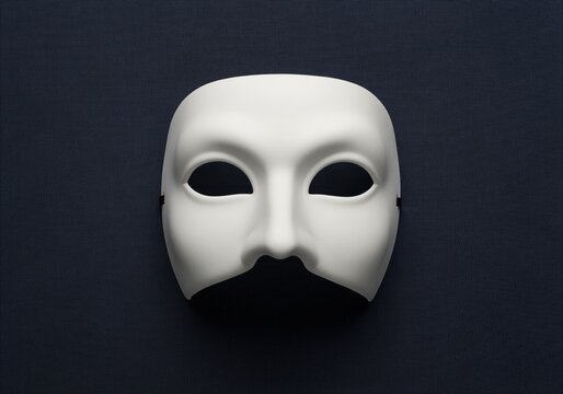 White bauta mask of commedia dellarte on a dark background