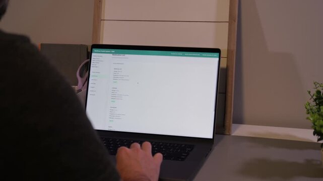 Middle Aged Man Checking His Electronic Medical Records - EMR at Home Concept