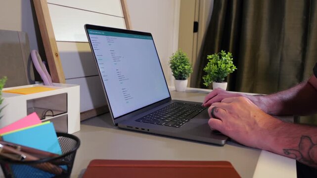 Middle Aged Man Checking His Electronic Medical Records - EMR at Home Concept