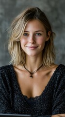 Confident diverse female team leader smiling during a video conference on a tablet in a light olive studio, professional and approachable mood.