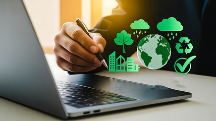 Business person using laptop with green sustainability and eco friendly icons
