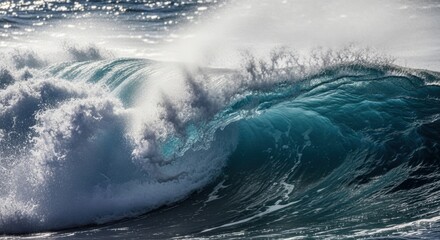 Powerful ocean wave crashing with white foam and turquoise water
