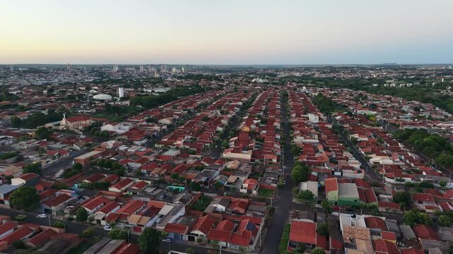 Aereal view aerial view of a densely populated urban area with red tile rooftops seen
