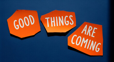 Inspirational message says good things are coming for businesses and personal growth with optimistic outlook in vibrant orange and blue tones
