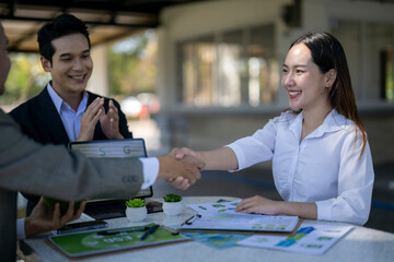 Business people shaking hands celebrating successful esg agreement