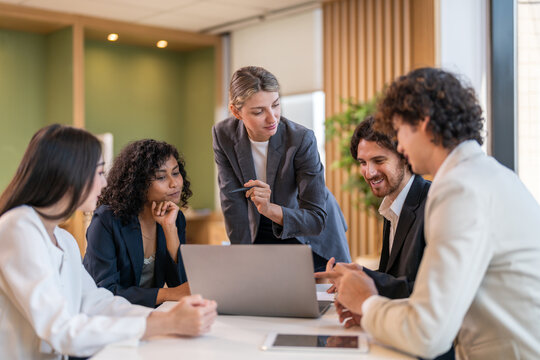 Leadership training, executive communication and team development in progress with diverse professionals in coaching seminar, strategic thinking and interpersonal skills in a modern workplace