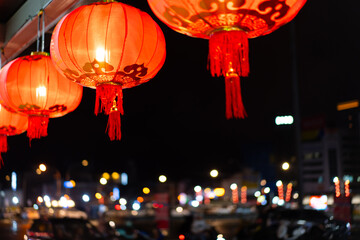 Traditional Red Chinese Lanterns Glowing Brightly at Night Festival