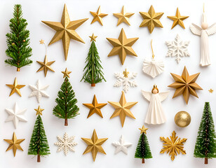 A festive Christmas decoration assortment with gold stars, white angels, snowflakes, and miniature trees in a flat lay on a white background