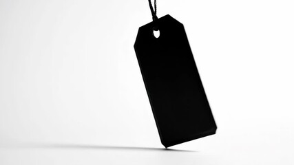 Black hanging tag isolated on a clean white background, ready for customization