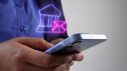 Bank emails. Businesswoman with smartphone in hand holding a virtual bank icon with a mailing envelope - Powered by Adobe