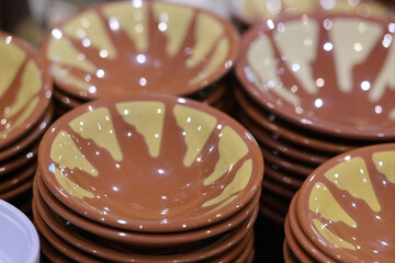 Rustic clay plates ready for delicious food service