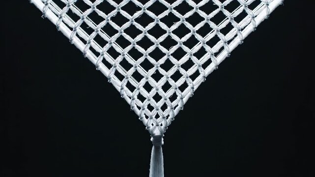 A "cat's cradle" metaphor, where chaotic, tangled, white threads in a dark void are re-organized into a beautiful, complex, and symmetrical geometric pattern.