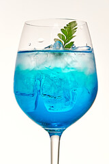 A refreshing blue curaçao cocktail in a glass
