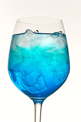 A refreshing blue curaçao cocktail in a glass