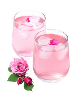 A refreshing glass of persian rose sharbat with a subtle pink color and ice cubes, a cooling summer beverage, isolated on white background